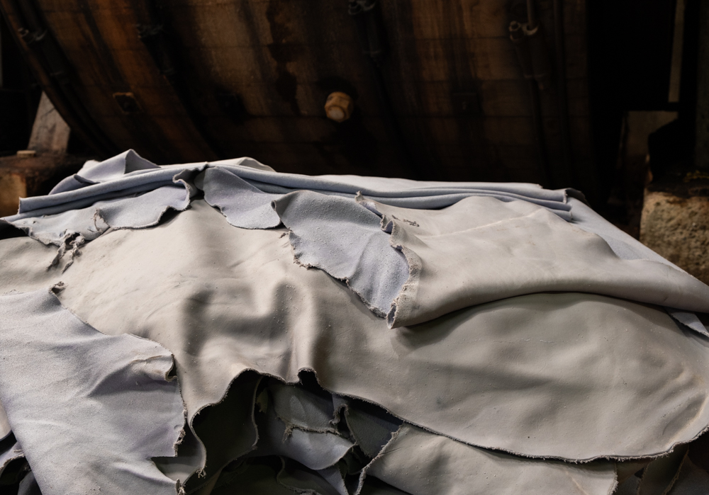 White leather resting in a pile in a leather tannery. 