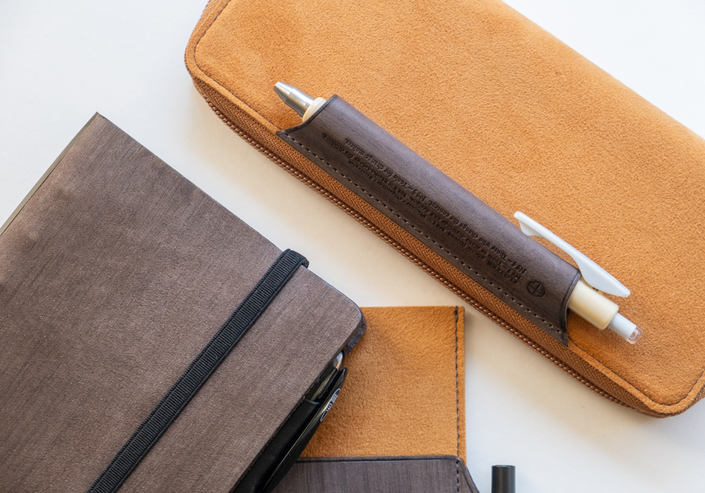 The yellow/gray PLOTTER Long Zipper Pen Case matches the Horse Hair II Leather Binder and Leather Binder Case.