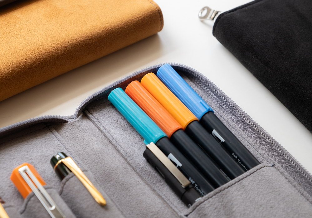 The right side of the PLOTTER Long Zipper Pen Case holds longer writing instruments.