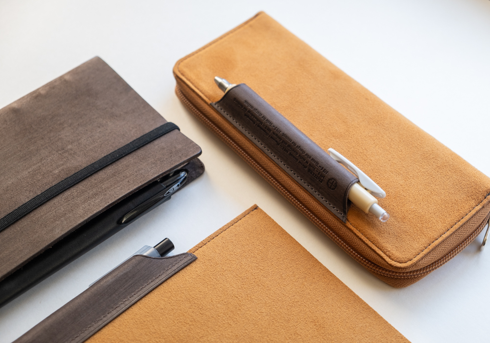 The yellow/gray PLOTTER Long Zipper Pen Case matches the Horse Hair II Leather Binder and Leather Binder Case.