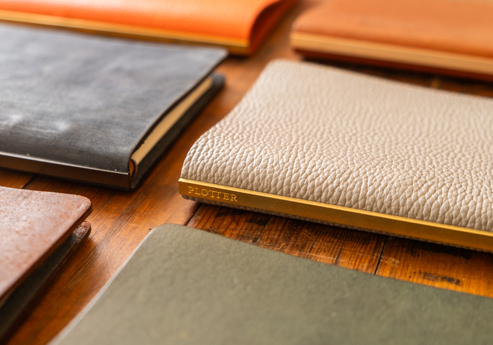 PLOTTER Leather Binders with a variety of leather types.