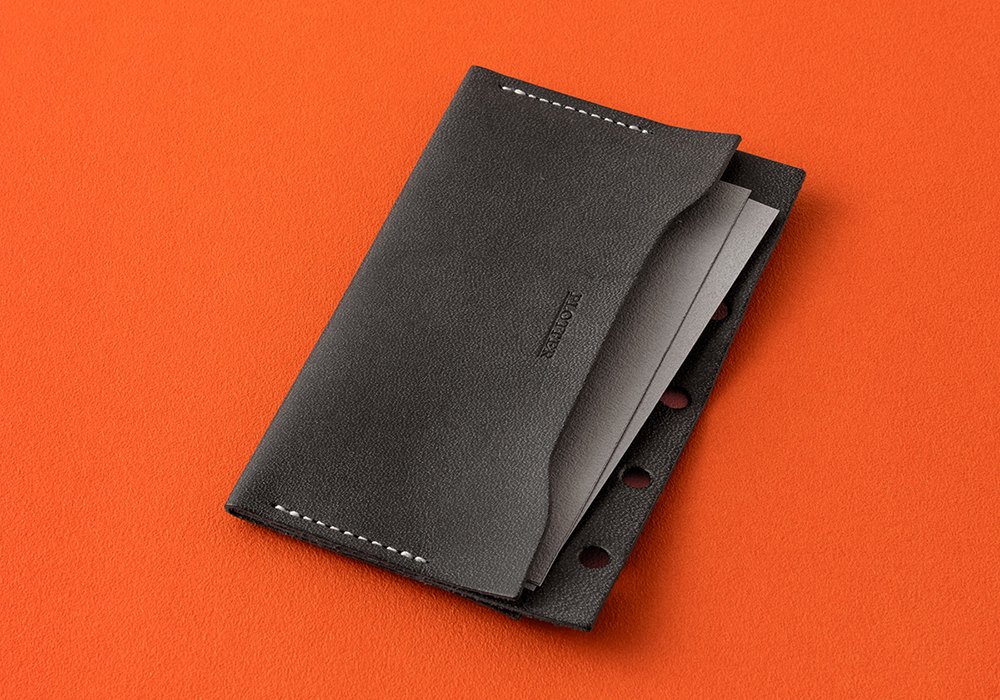 Leather Card Case Double Pocket holding business cards.