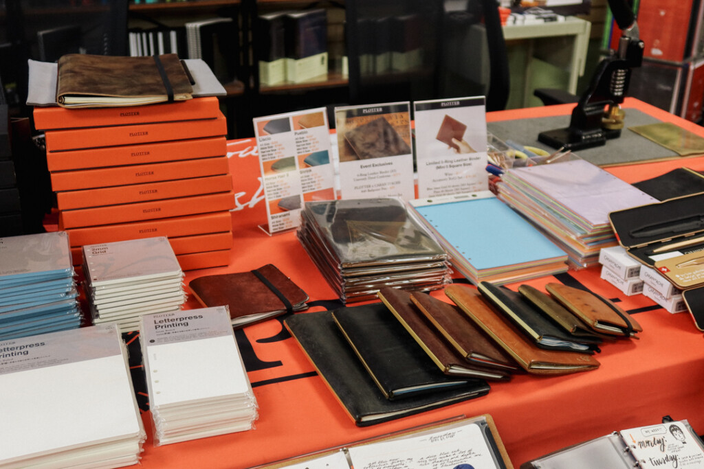 The PLOTTER display at Dromgoole's Fine Writing Instruments store filled with sample leather binders and other event-limited items.